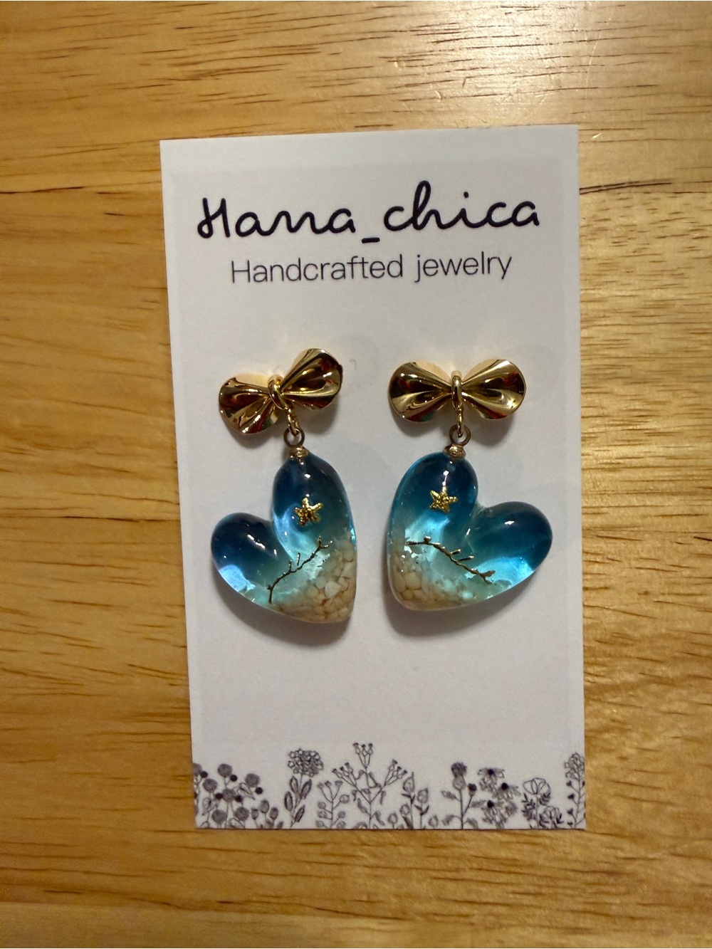 Hana_chica Handcrafted Resin Heart Earrings with Gold Bow